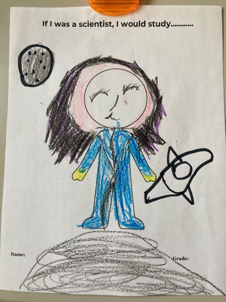 A child's image responding to "If I was a scientist, I would study (blank)"
